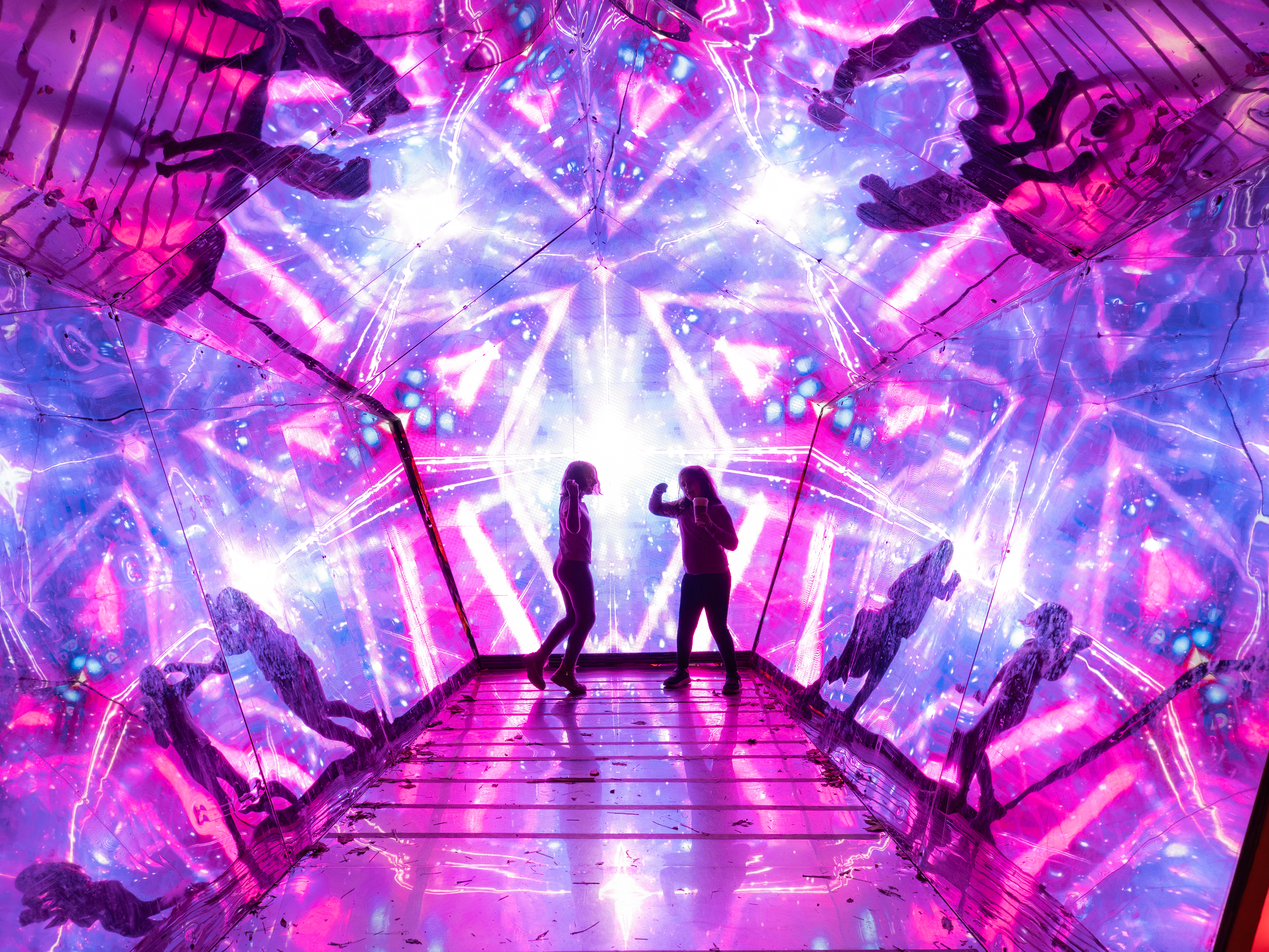 kids playing in immersive art exhibit