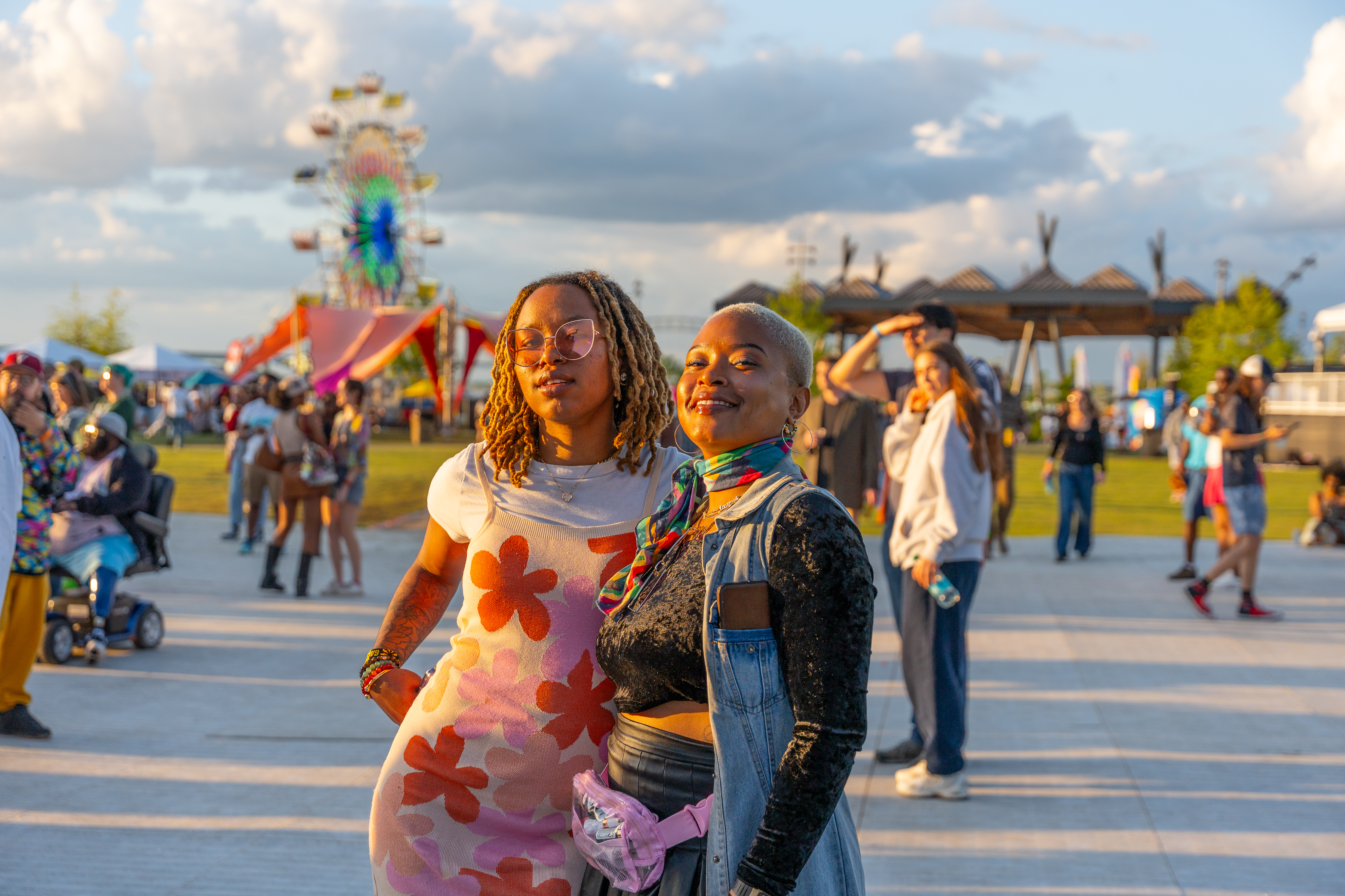 two women posing at music festival