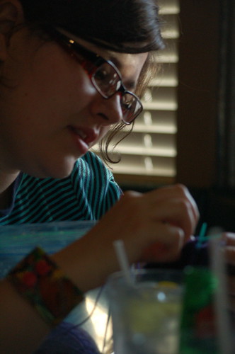 April Blankenship, hard at work on a sock. April Blankenship, hard at work on a sock.