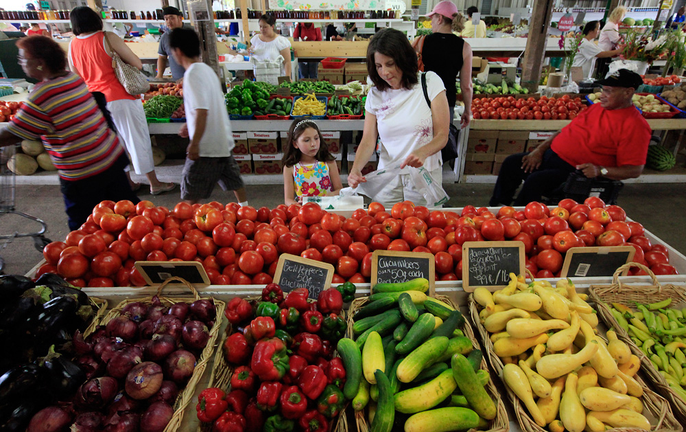 woman and child shopping at market